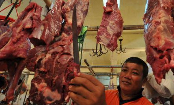 Ilustrasi: penjual daging sapi di pasar tradisional.