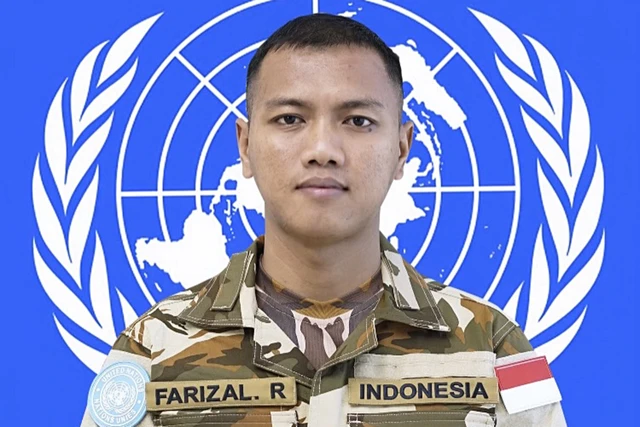 Almarhum Farizal Rhomadhon.