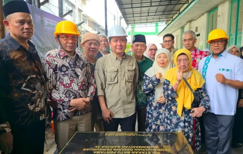 Peletakan batu pertama pembangunan gedung Garuda 33. (ist)